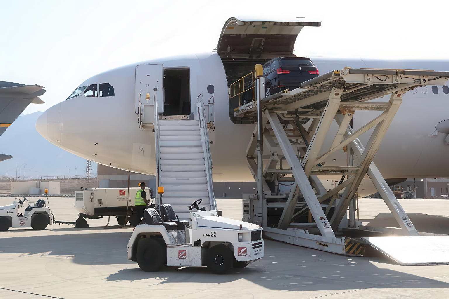 Cargo Handling | A private car loaded into bay.