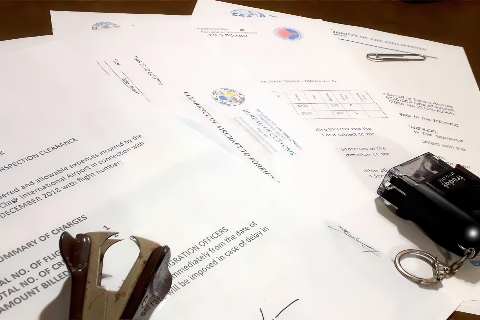 Permits & Clearance | A pile of permits.