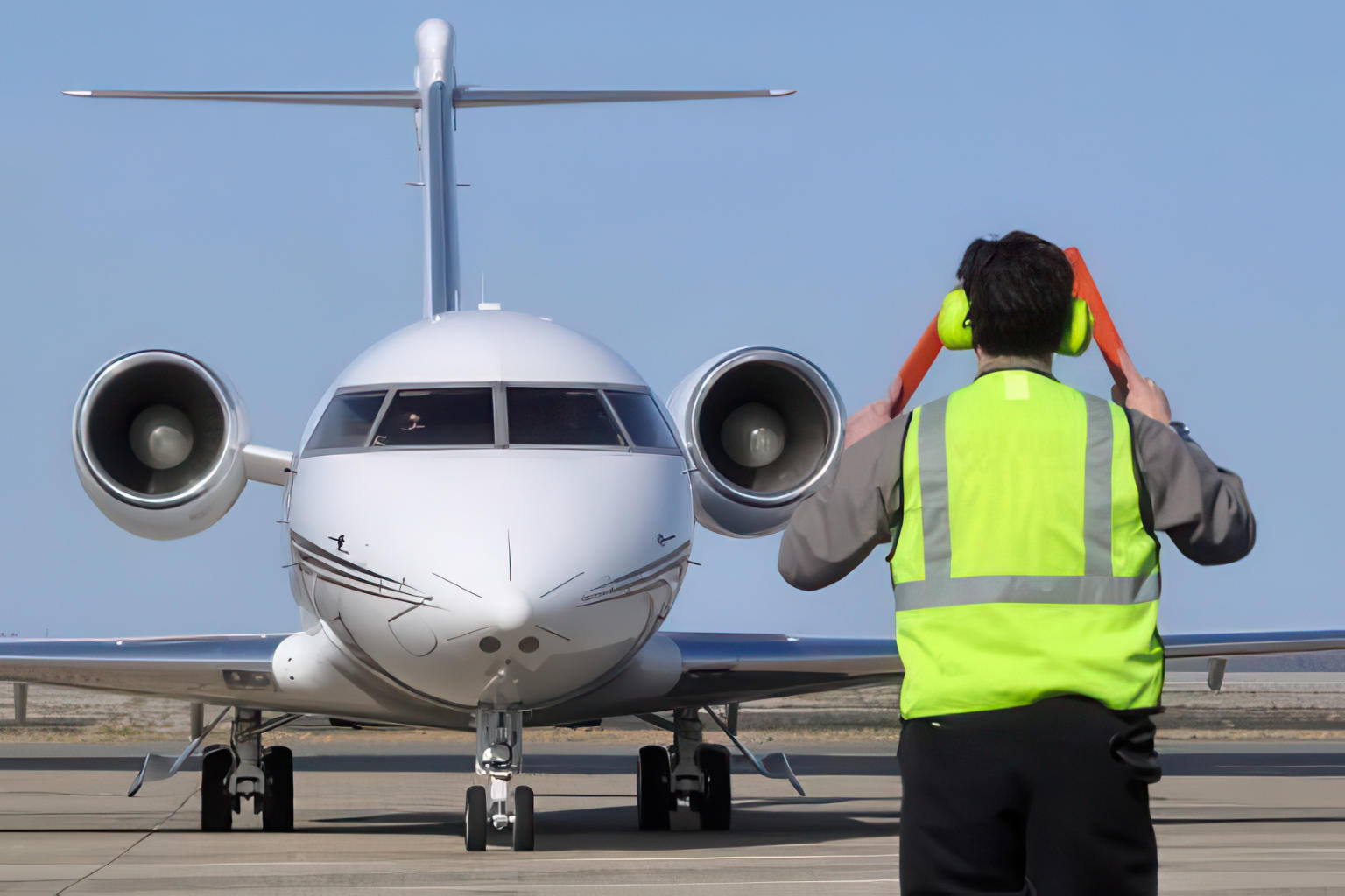 Ramp Service | Crew parking a jet.